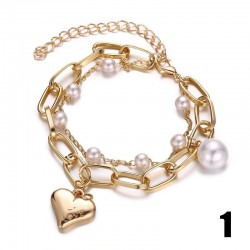 Elegant bracelet with charms & pearlsBracelets