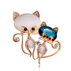 Brooch with two crystal foxes