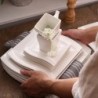 Vaisselle élégante - service de table en porcelaine blanche - tasses - soucoupes - assiettes