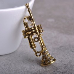 Gold trumpet - with crystals - broochBrooches