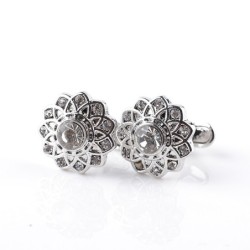Gemelli in argento a forma di fiore con cristalli