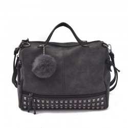 Sac vintage en cuir nubuck avec rivets / pompon fourrure