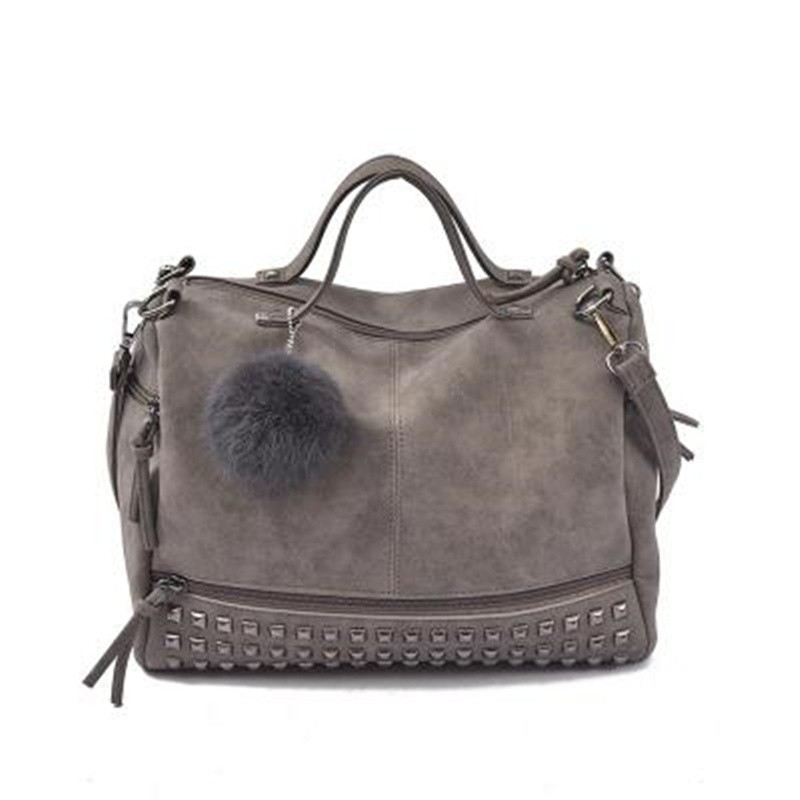 Vintage nubuck leather bag with rivets / fur pom pomBags