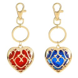 Coeur en cristal dans cage dorée - porte-clés