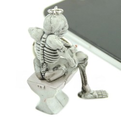 Squelette assis sur les toilettes - porte-clés en caoutchouc